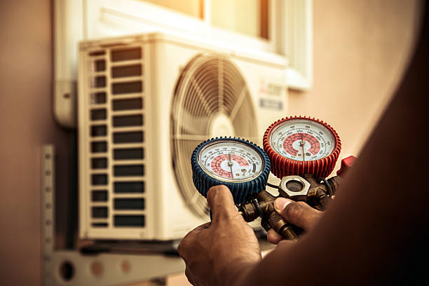Professional Air Conditioning Service technician working in Sneads, FL
